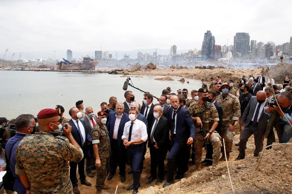 French President Emmanuel Macron visits the devastated site of the explosion at the port of Beirut