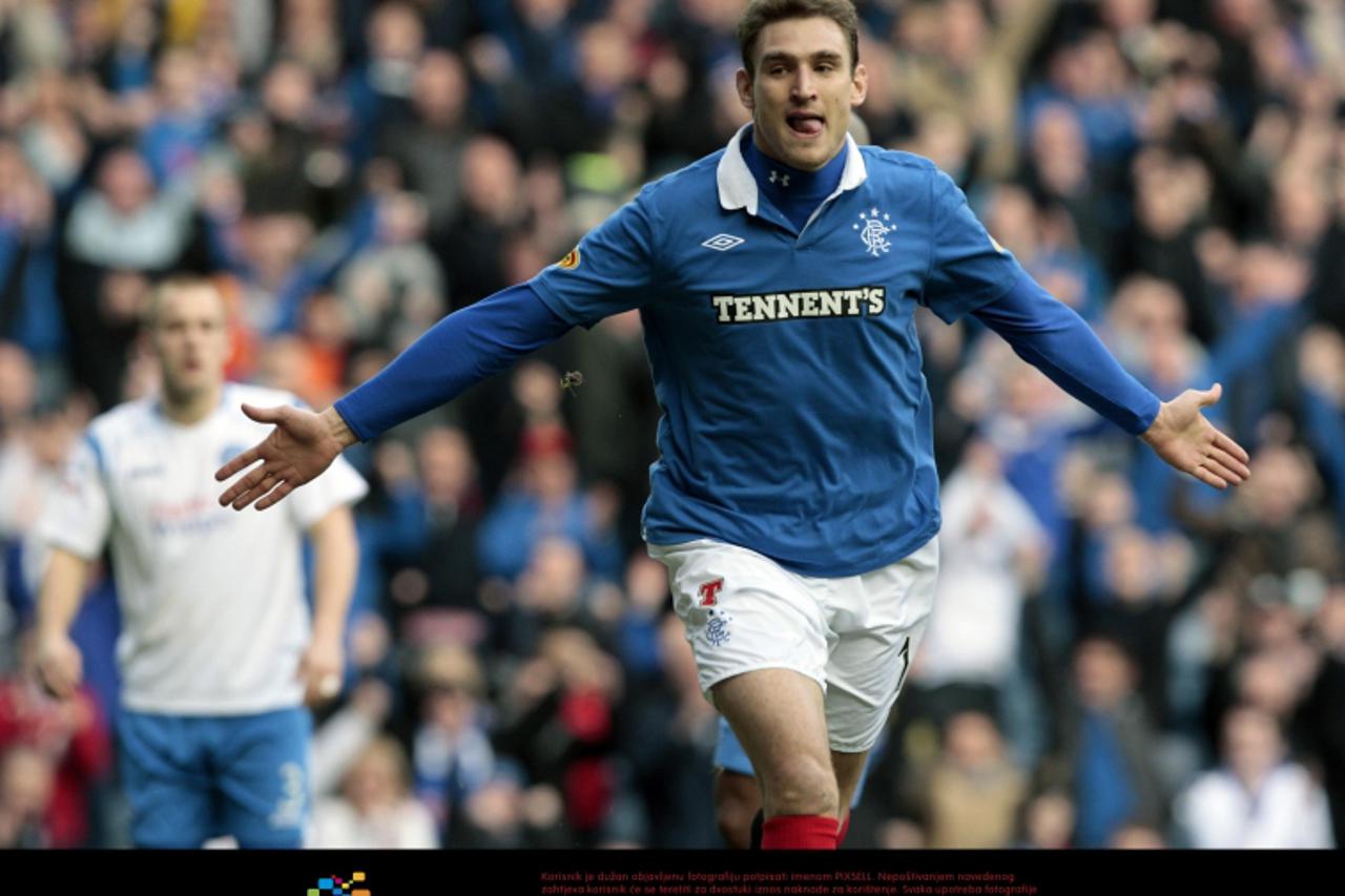 \'Rangers Nikica Jelavic celebrates his goal during the Clydesdale Bank Scottish Premier League match at Ibrox, Glasgow. Photo: Press Association/Pixsell\'