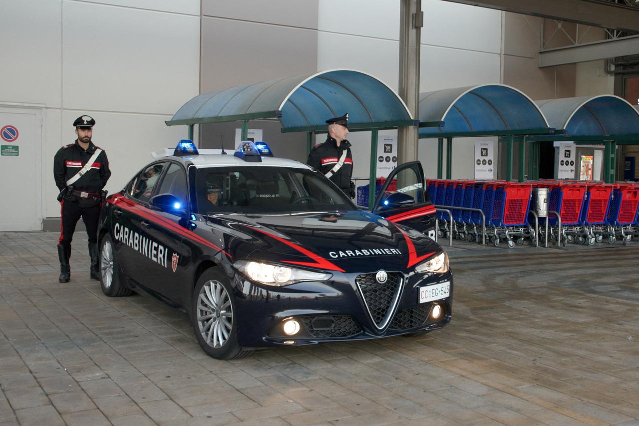 FILE PHOTO: Carabinieri paramilitary police officers stand guard near the site where several people were injured, including Monza's football player Pablo Mari, after a stabbing incident in Assago