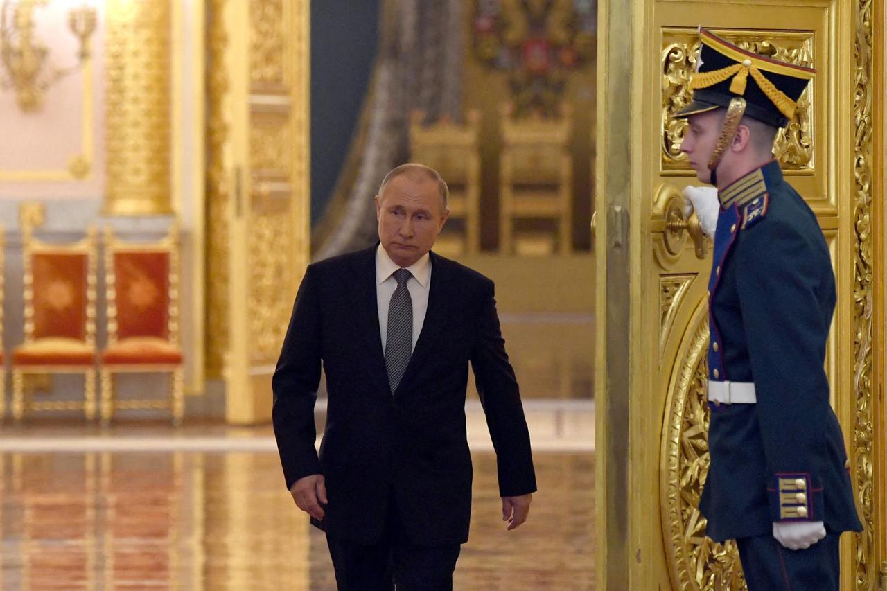 FILE PHOTO: Russian President Vladimir Putin meets graduates from military academies in Moscow