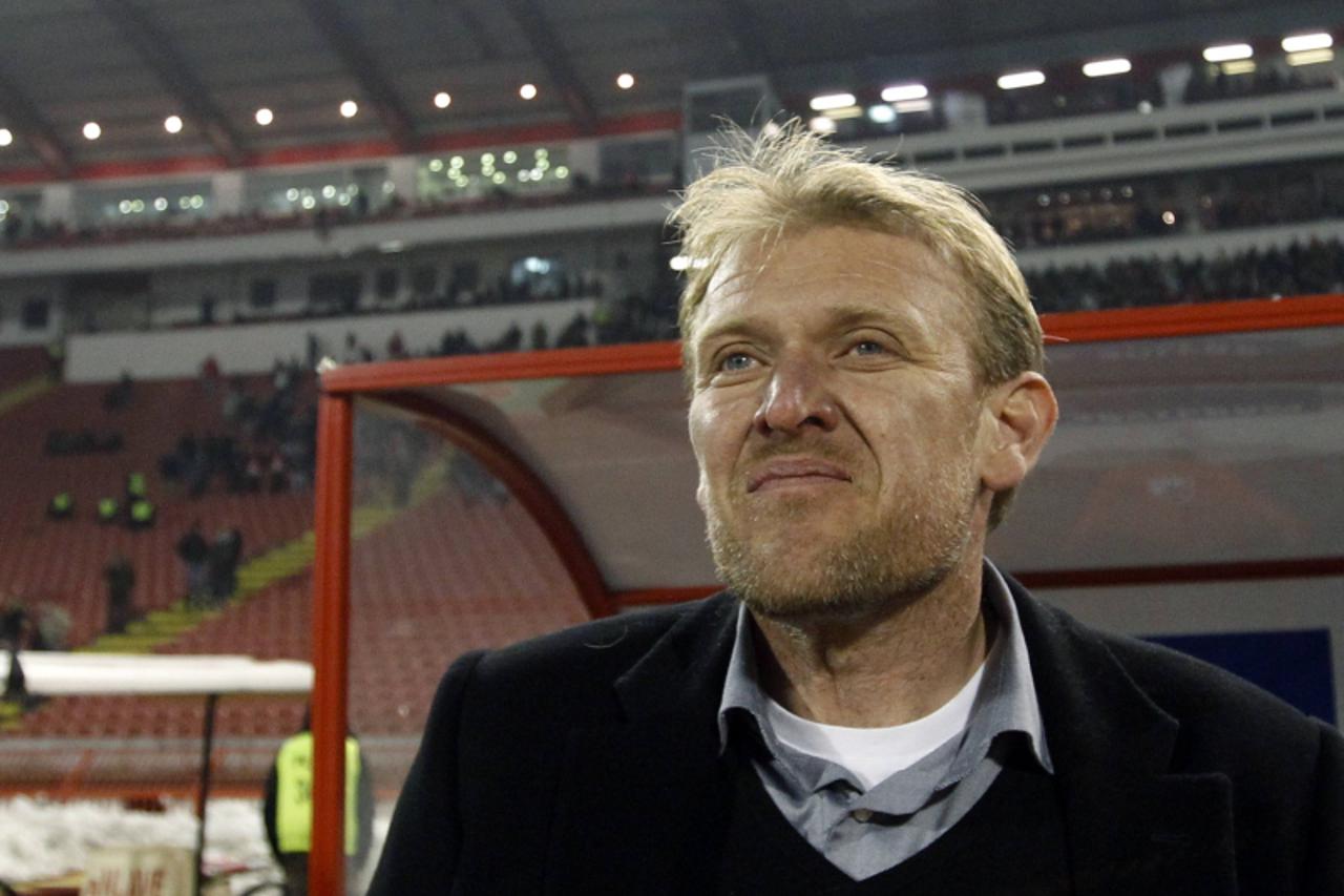 'Robert Prosinecki arrives at his first official match as a coach of Red Star Belgrade against F.C. Smederevo in Belgrade March 5, 2011. Prosinecki played for Red Star in 1991 when the most popular Se