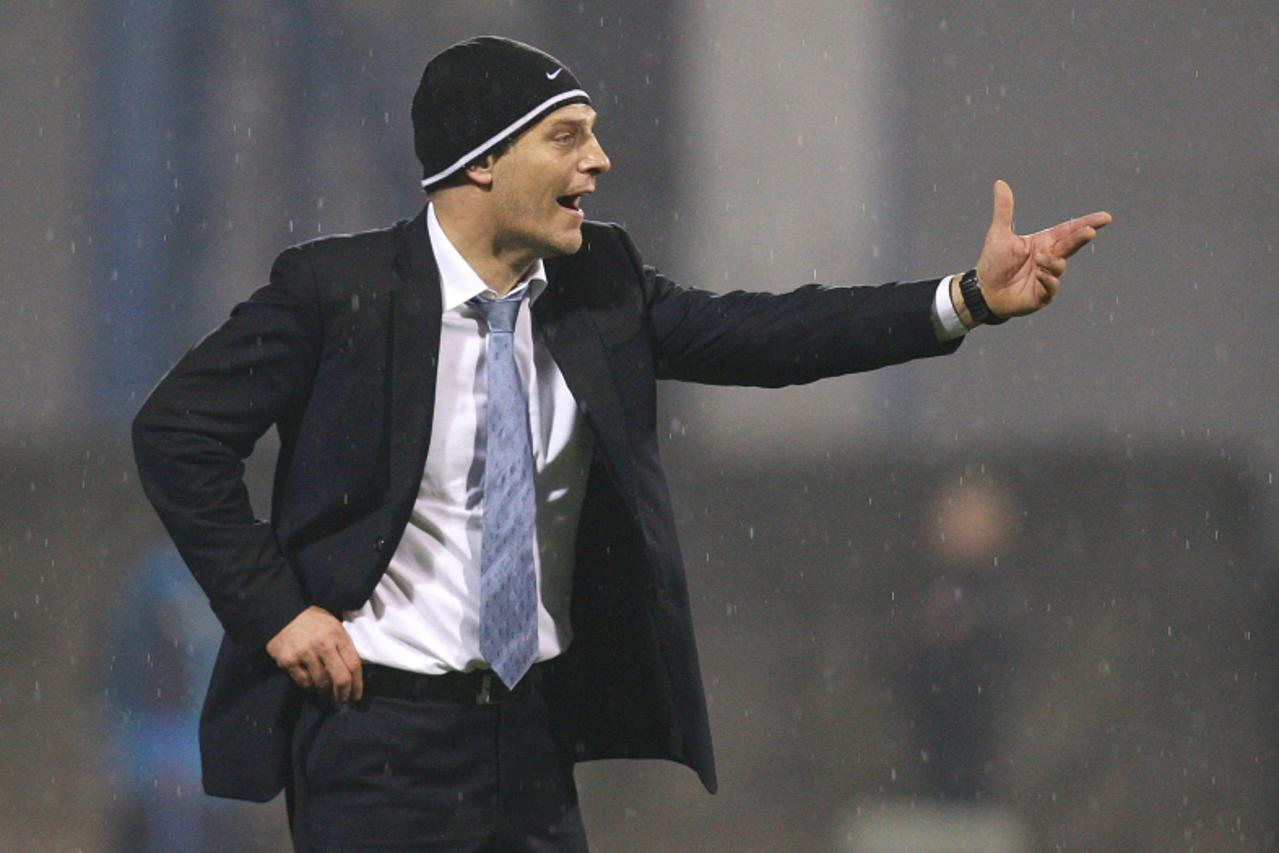 'Croatia\'s head coach Slaven Bilic reacts during the European Championships 2012 qualifying group F football match against Malta at the Maksimir stadium in Zagreb on November 17, 2010. AFP PHOTO'