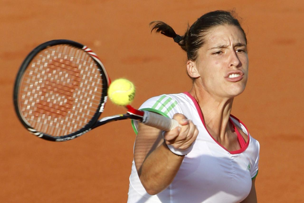 \'Andrea Petkovic of Germany returns the ball to Maria Kirilenko of Russia during the French Open tennis tournament at the Roland Garros stadium in Paris May 30, 2011.               REUTERS/Regis Duvi