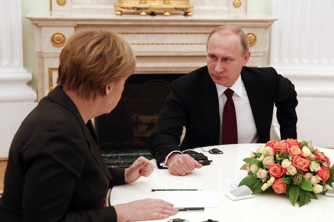 Vladimir Putin,Angela Merkel