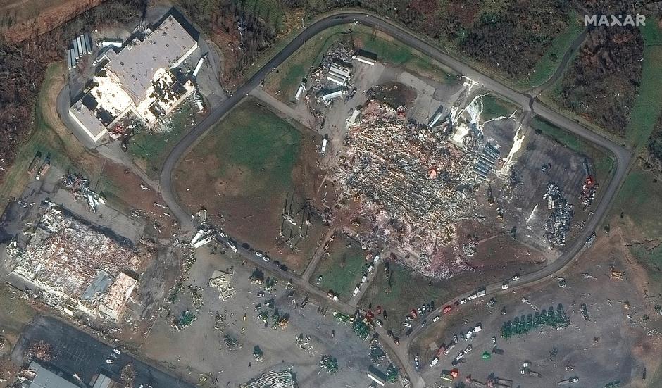 A satellite image shows a candle factory and nearby buildings after a devastating outbreak of tornadoes ripped through several U.S. states, in Mayfield