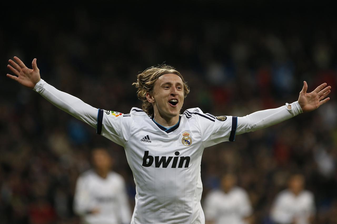 Real Madrid's Luka Modric celebrates scoring against Real Mallorca during their Spanish first division soccer match at Santiago Bernabeu stadium in Madrid March 16, 2013. REUTERS/Susana Vera (SPAIN - Tags: SPORT SOCCER)  Picture Supplied by Action Images