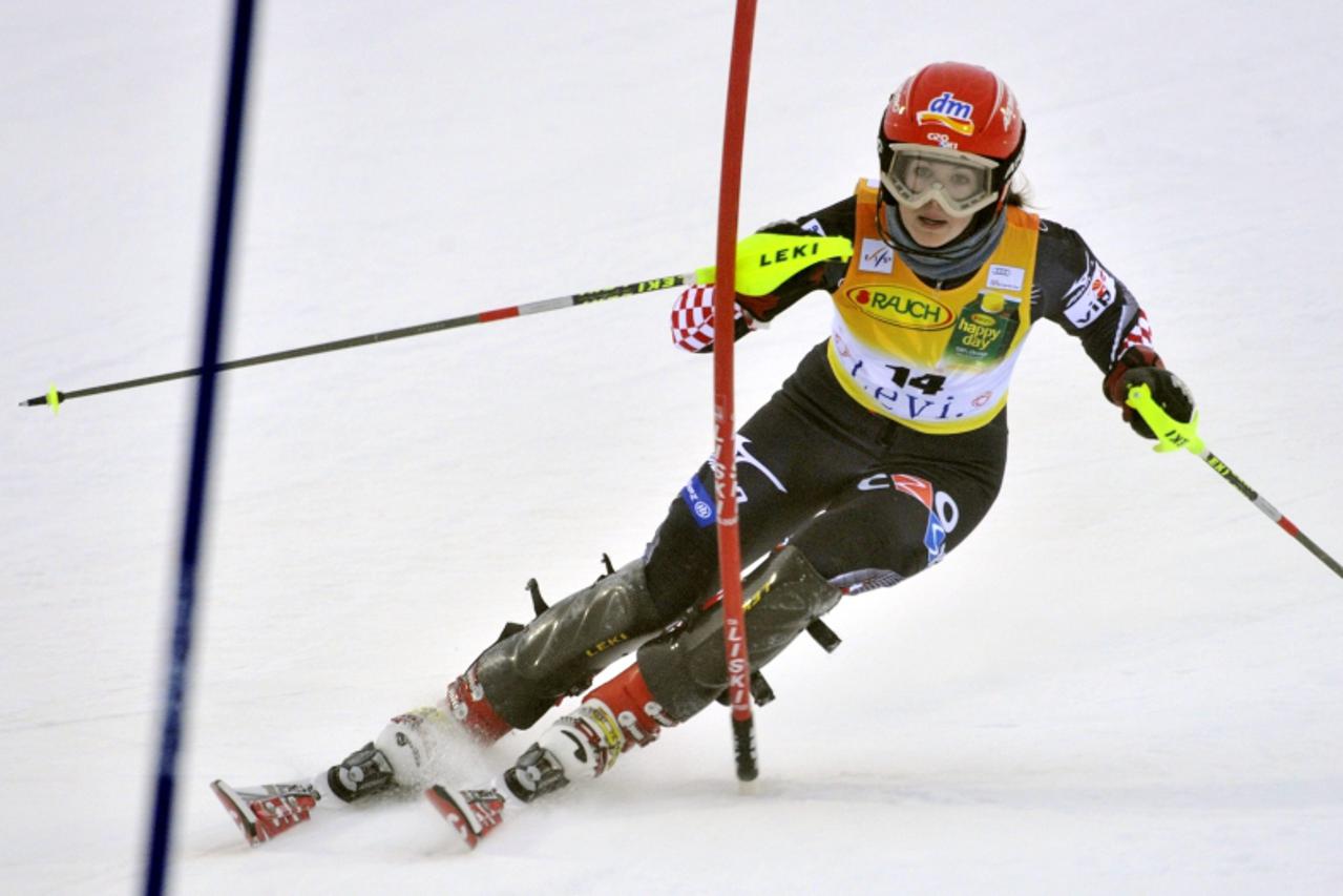 'Ana Jelusic of Croatia  clears a pole during the FIS Alpine World Cup women\'s slalom competition in Levi, Finland on November 14, 2009. AFP  PHOTO LEHTIKUVA / Mikko Stig *** FINLAND OUT ***'