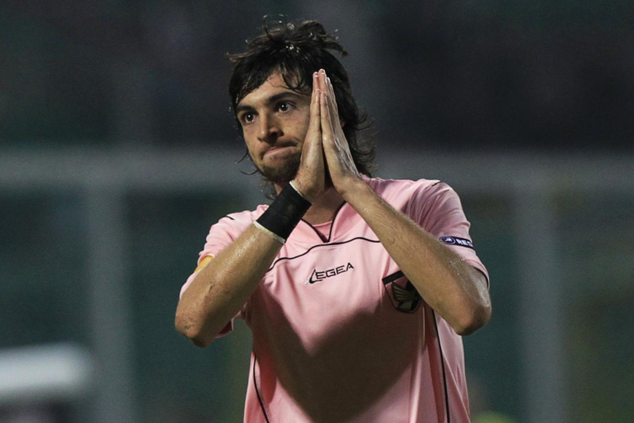 'Palermo\'s Javier Pastore reacts as he leaves the field after receiving a red card during their Europa League Group F soccer match against CSKA Moscow in Palermo October 21, 2010.  REUTERS/Alessandro