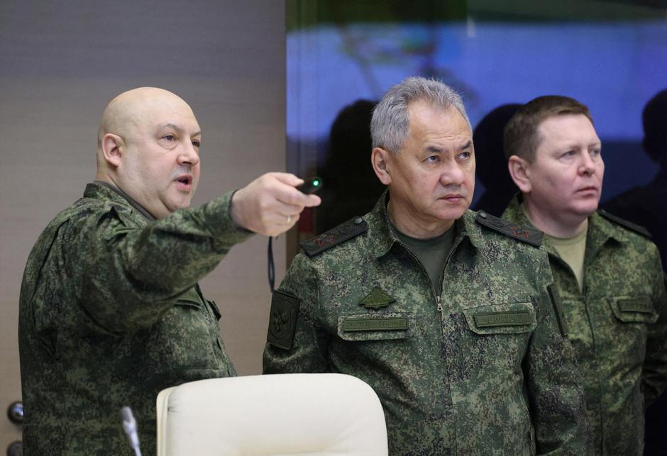 Russian Defence Minister Sergei Shoigu and General Sergei Surovikin visit the Joint Headquarters of the Russian armed forces, in an unknown location