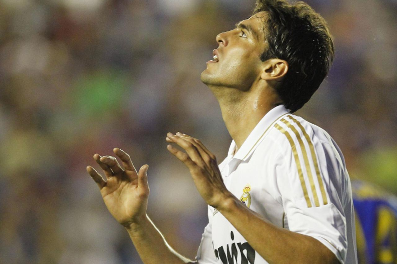 \'Real Madrid\'s Kaka reacts during their Spanish first division soccer match against Levante at the Ciudad de Valencia Stadium in Valencia, September 18, 2011. REUTERS/Heino Kalis (SPAIN - Tags: SPOR