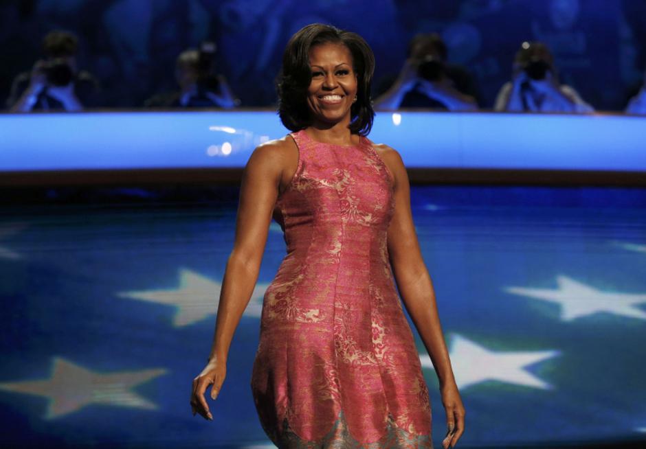 'U.S. first lady Michelle Obama arrives on stage before addressing the first session of the Democratic National Convention in Charlotte, North Carolina September 4, 2012. REUTERS/Eric Thayer (UNITED S