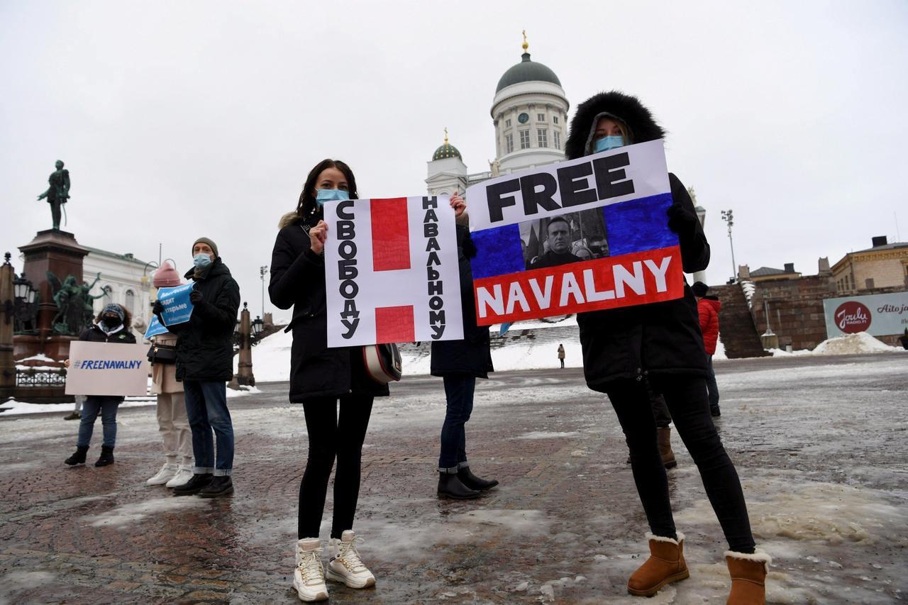 Demonstrators supporting jailed opposition leader Alexei Navalny in Helsinki