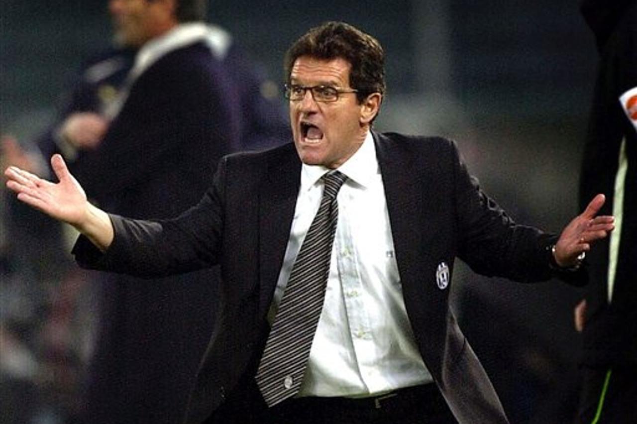 '** FILE ** Juventus coach Fabio Capello shouts indications to his players during the Italian first division soccer match between Juventus and Lazio, at the Turin delle Alpi stadium, in this Sunday, D