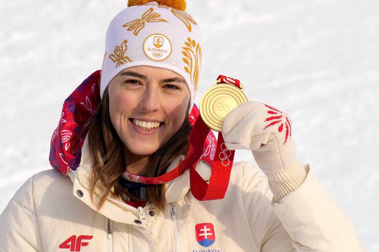 Vlhova of Slovakia shows off her gold medal in the women's Slalom at the Winter Olympics