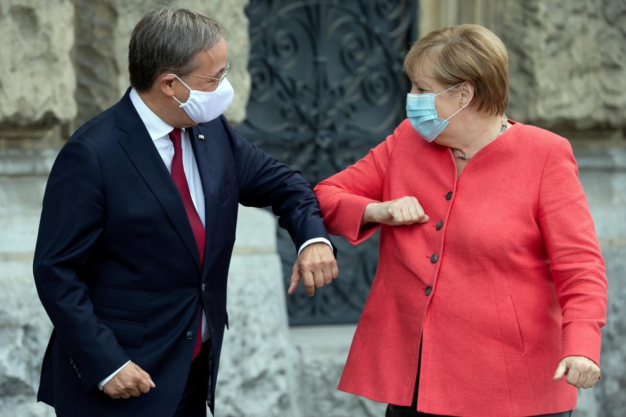 FILE PHOTO: German Chancellor Merkel meets Armin Laschet in Duesseldorf