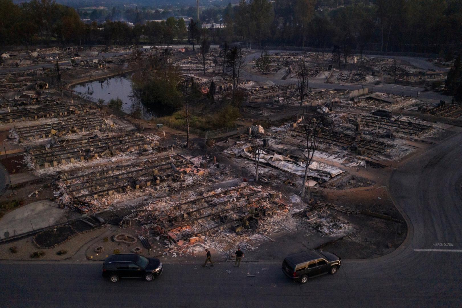 Security officials survey neighborhood left devastated by the Almeda fire in Phoenix, Oregon Security officials survey the Bear Lakes Estates neighborhood which was left devastated by the Almeda fire in Phoenix, Oregon, U.S., September 9, 2020. Image taken with a drone. REUTERS/Adrees Latif     TPX IMAGES OF THE DAY ADREES LATIF