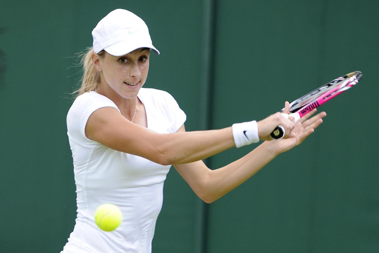 Croatia's Petra Martic in action against Germany's Sabine Lisicki during day one of the 2012 Wimbledon Championships at the All England Lawn Tennis Club, Wimbledon.  Photo: Press Association/PIXSELL