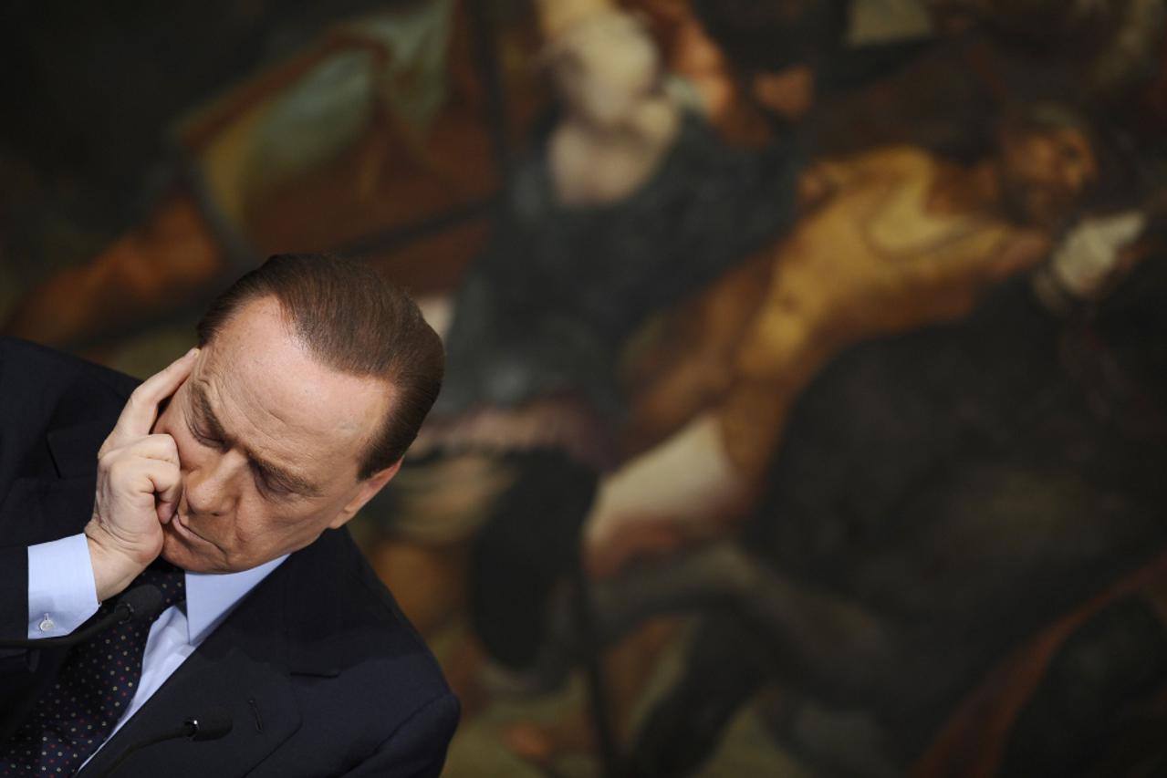 Berlusconi glavobolja