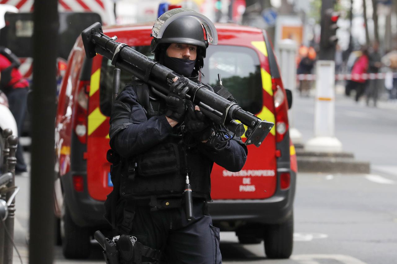A special intervention force member leaves the scene of an operation in Paris, France, May 26, 2016.  REUTERS/Benoit Tessier