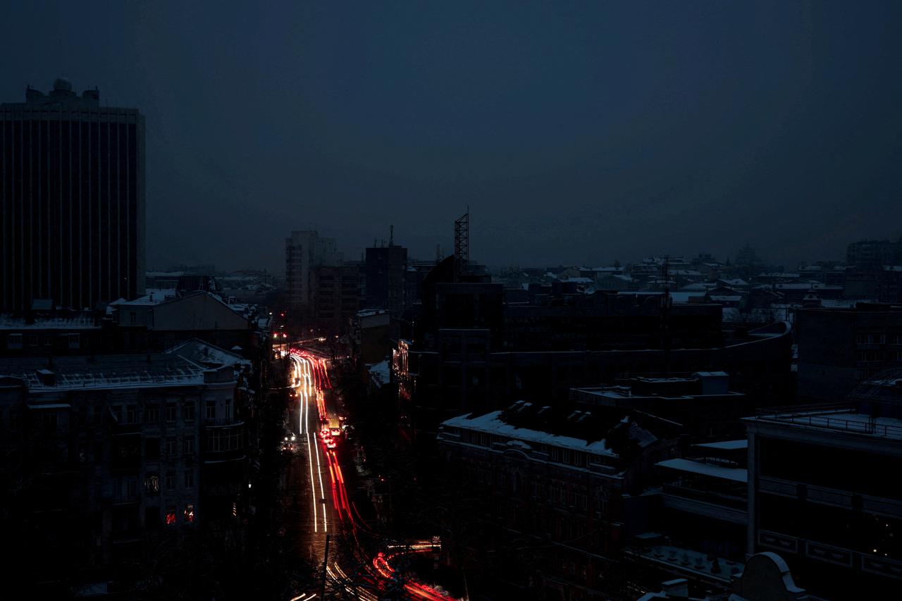 FILE PHOTO: A view shows the city without electricity after critical civil infrastructure was hit by Russian missile attacks in Kyiv
