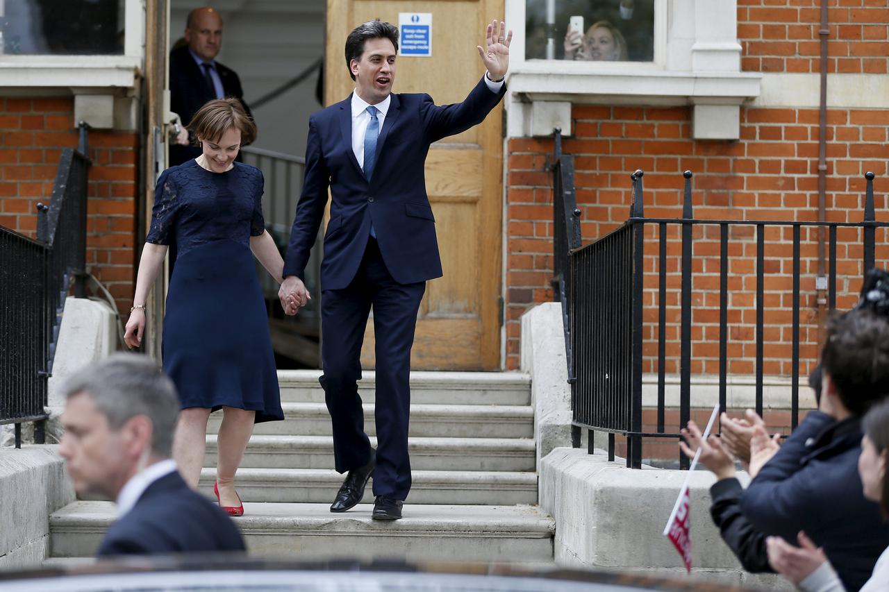 Britain's opposition Labour Party leader Ed Miliband and his wife Justine leave after attending an election event at the Royal Horticultural Halls in London, Britain May 2, 2015. REUTERS/Stefan Wermuth