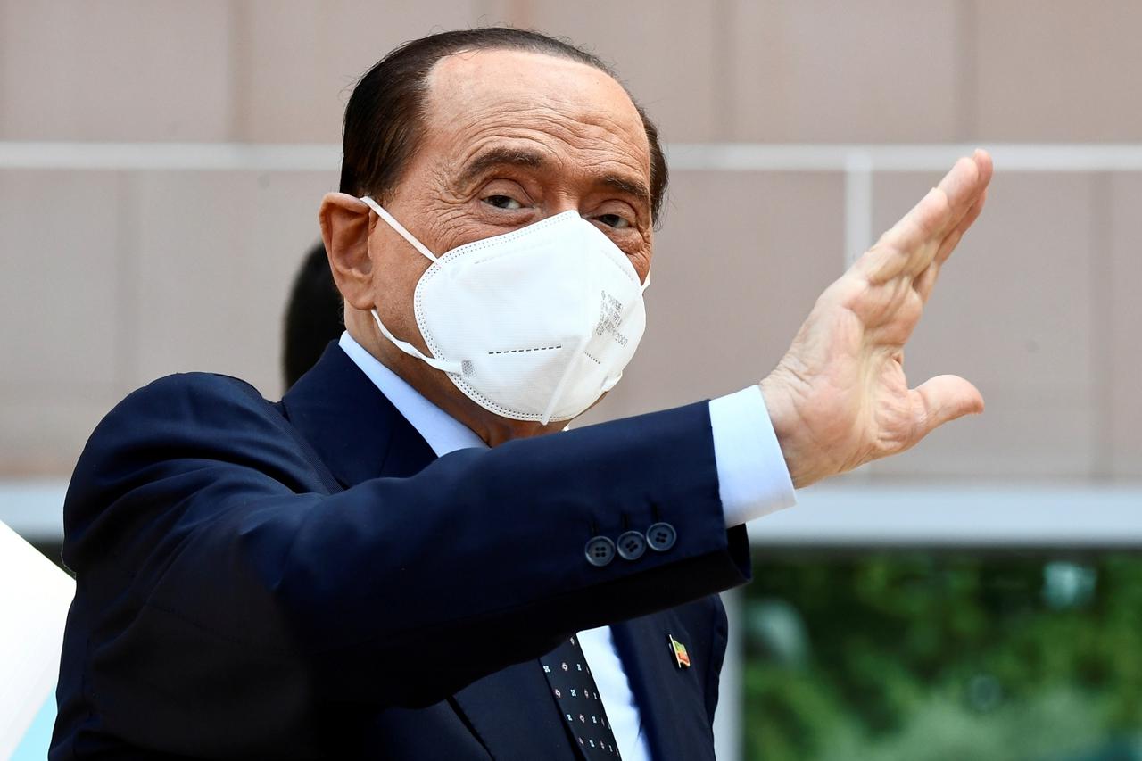 FILE PHOTO: Former Italian Prime Minister Silvio Berlusconi is discharged from Milan's San Raffaele hospital