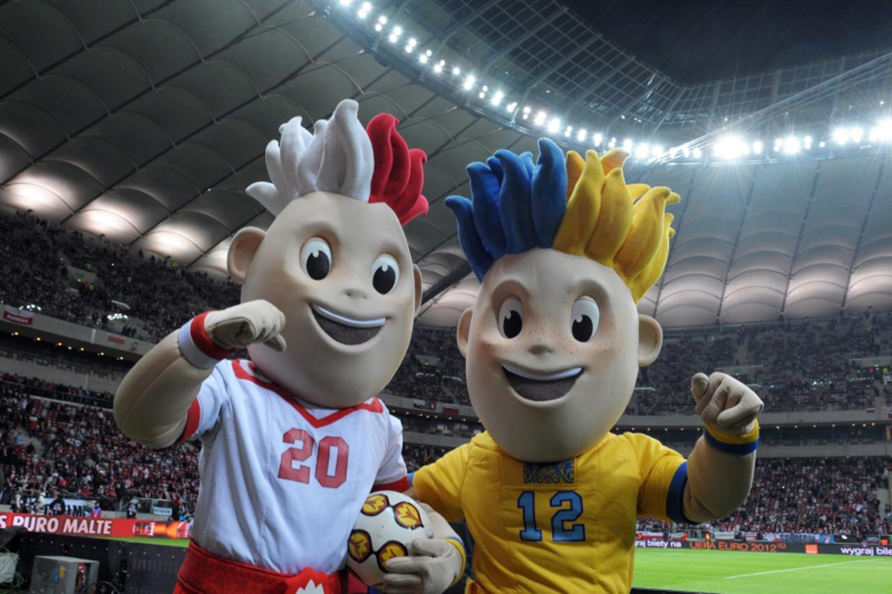 \'The mascot for the Euro-2012 football championships co-hosted by Poland and Ukraine, Slavek (L) and Slavko pose prior to the friendly football match Poland vs Portugal on February 29, 2012 in Warsaw