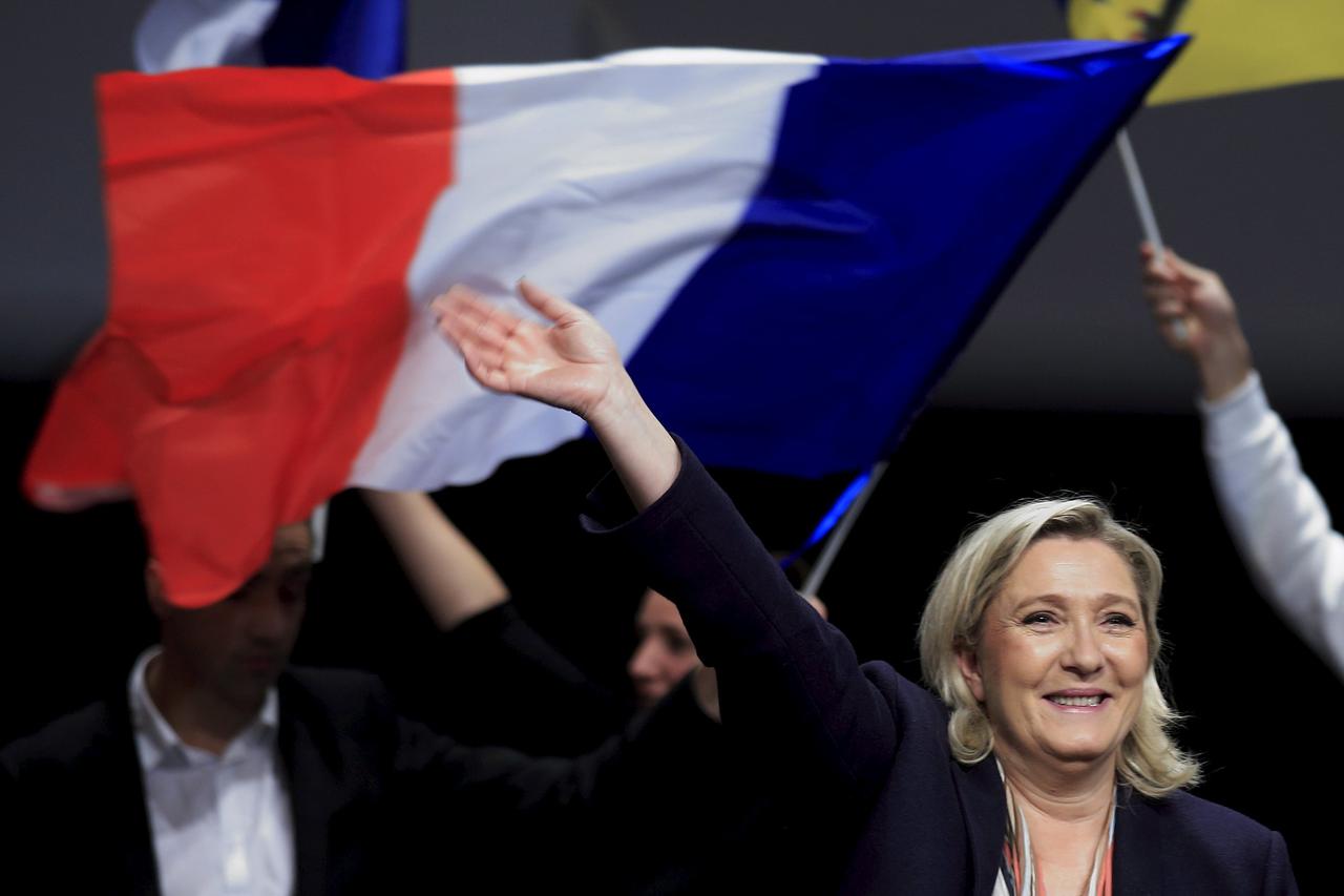 Marine Le Pen, French National Front political party leader and candidate for the National Front in the Nord-Pas-de-Calais-Picardie region, attends a political rally as she campaigns for the upcoming regional elections in Lille, France, November 30, 2015.