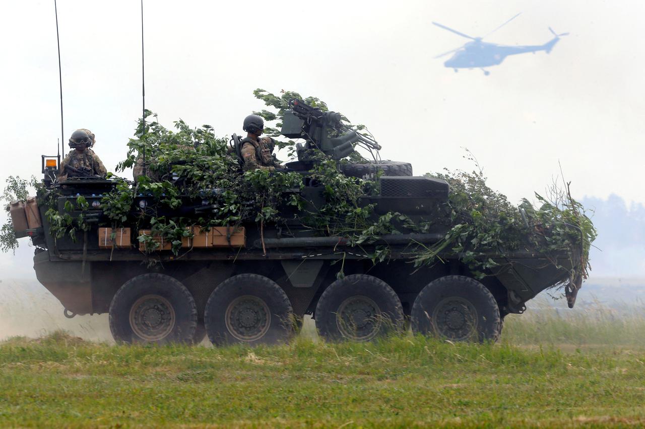 FILE PHOTO: U.S. army soldiers with their Stryker armoured fighting vehicle attend the final day of NATO Saber Strike exercises in Orzysz