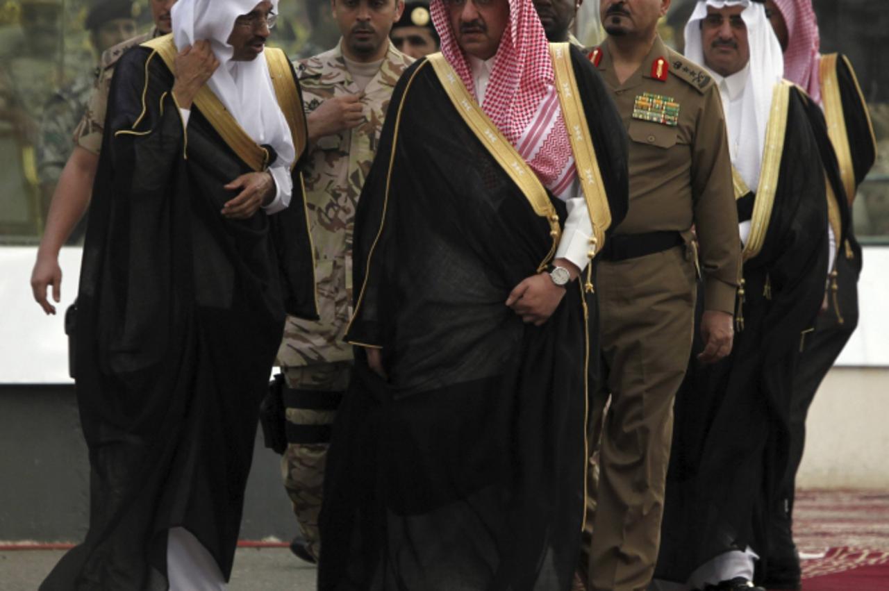 'Saudi Deputy Interior Minister Prince Mohammed bin Nayef bin Abdul Aziz (C) arrives at a military parade in preparation for the annual haj pilgrimage in Mecca October 20, 2012. On October 25, the day