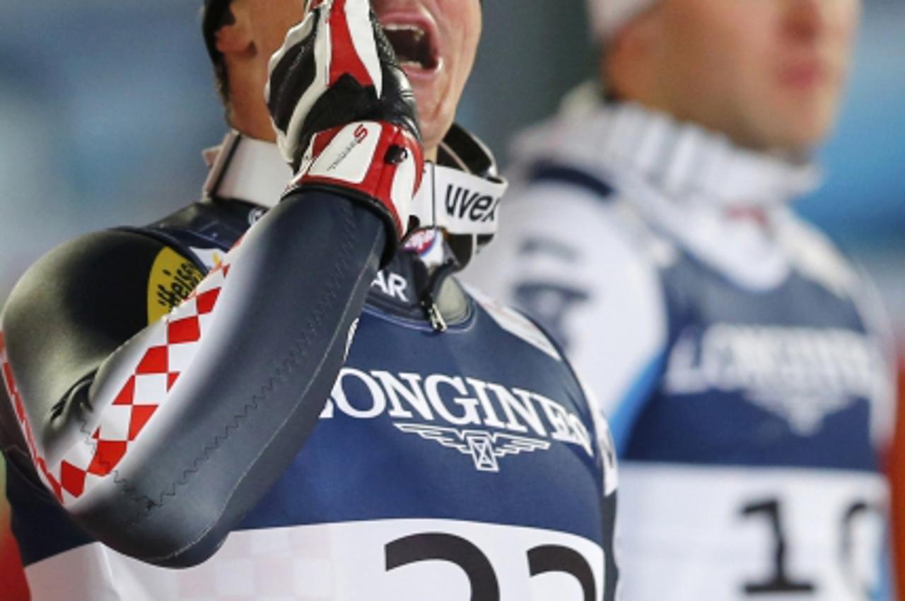 'Second placed Ivica Kostelic of Croatia reacts after the men\'s super combined event at the World Alpine Skiing Championships in Schladming February 11, 2013.  REUTERS/Leonhard Foeger (AUSTRIA  - Tag