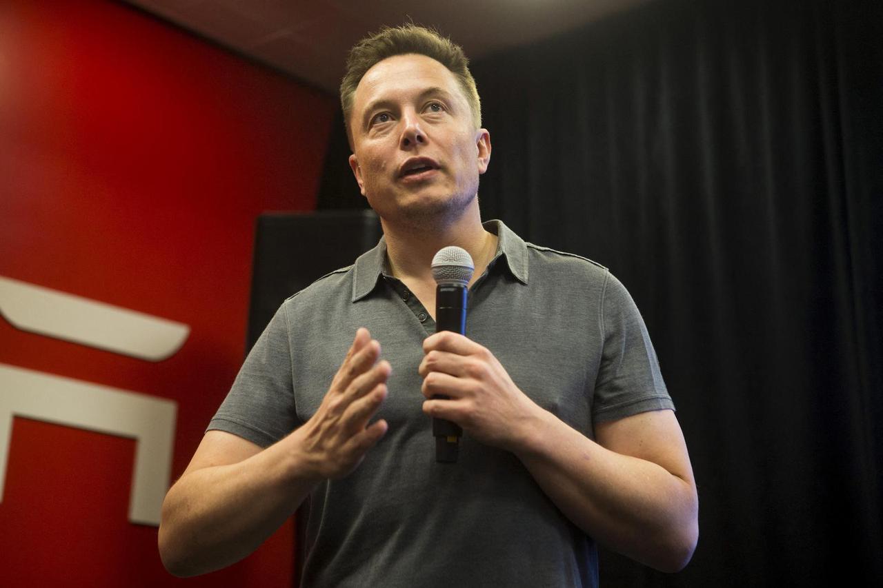 FILE PHOTO: Tesla CEO Elon Musk speaks about new Autopilot features during a Tesla event in Palo Alto