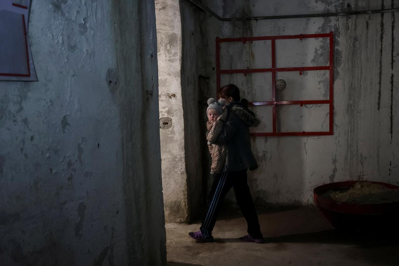 Zhenia, 6-months-old and his mother, Shevchenko are seen in bomb shelter in Kharkiv