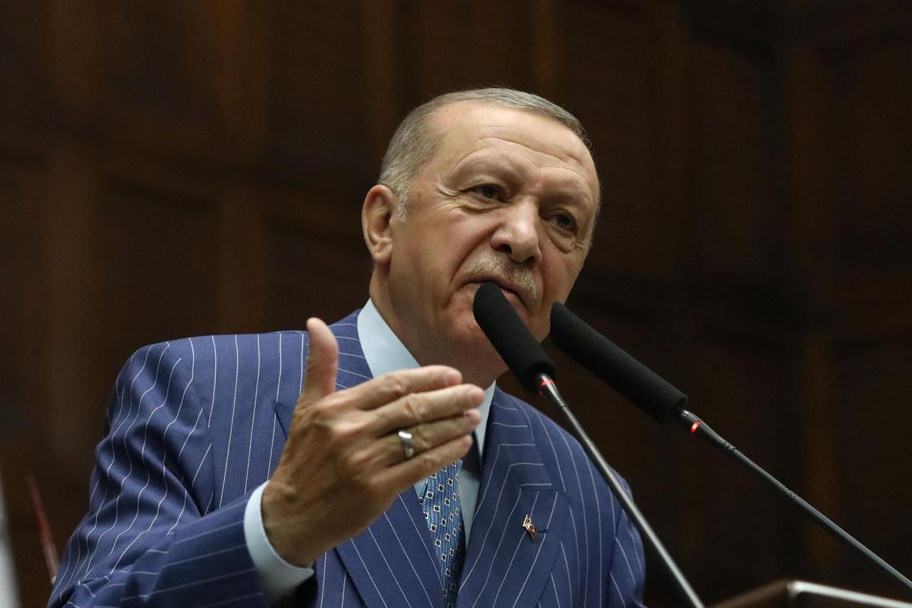 Turkey's President Recep Tayyip Erdogan delivers a speech in parliament