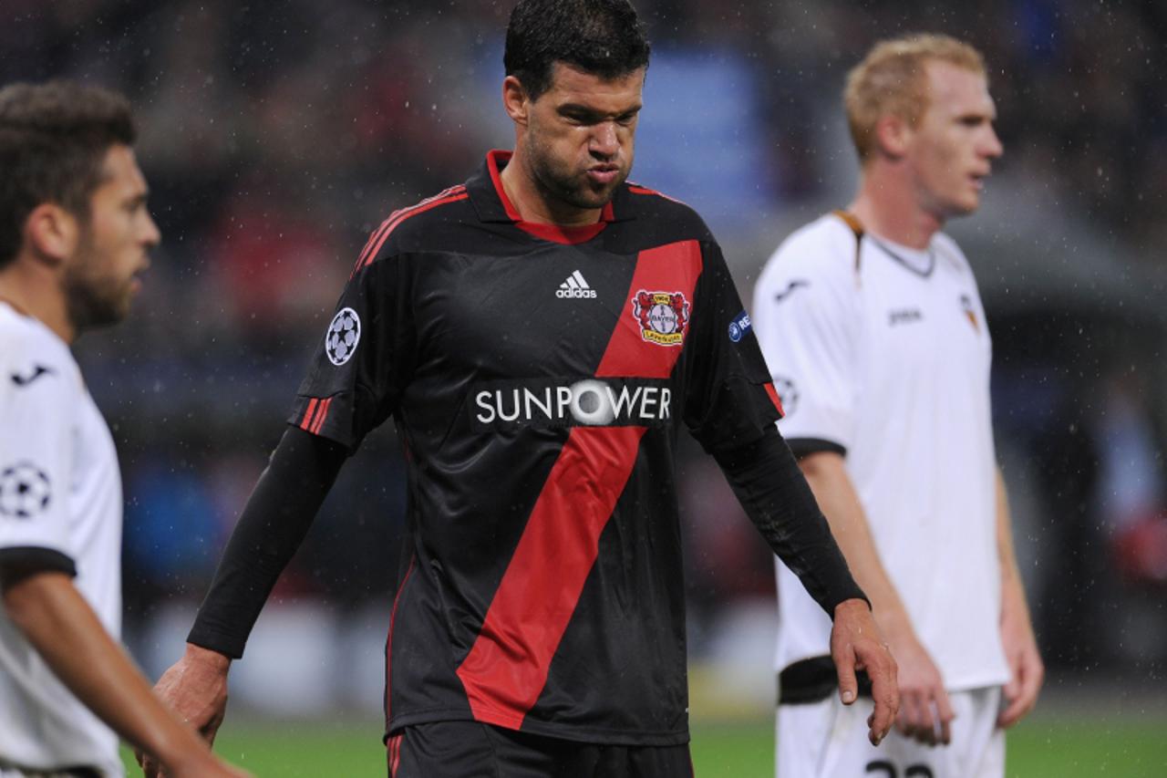 'Leverkusen\'s midfielder Michael Ballack reacts during the UEFA Champions League Group E first leg match of Bayer Leverkusen (Germany) against Valencia CF (Spain) on October 19, 2011 at the bayArena 