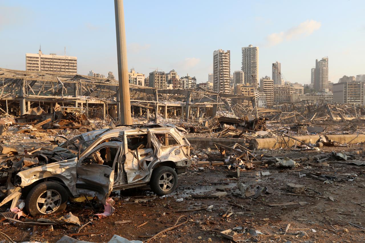 A soldier stands at the devastated site of the explosion at the port of Beirut