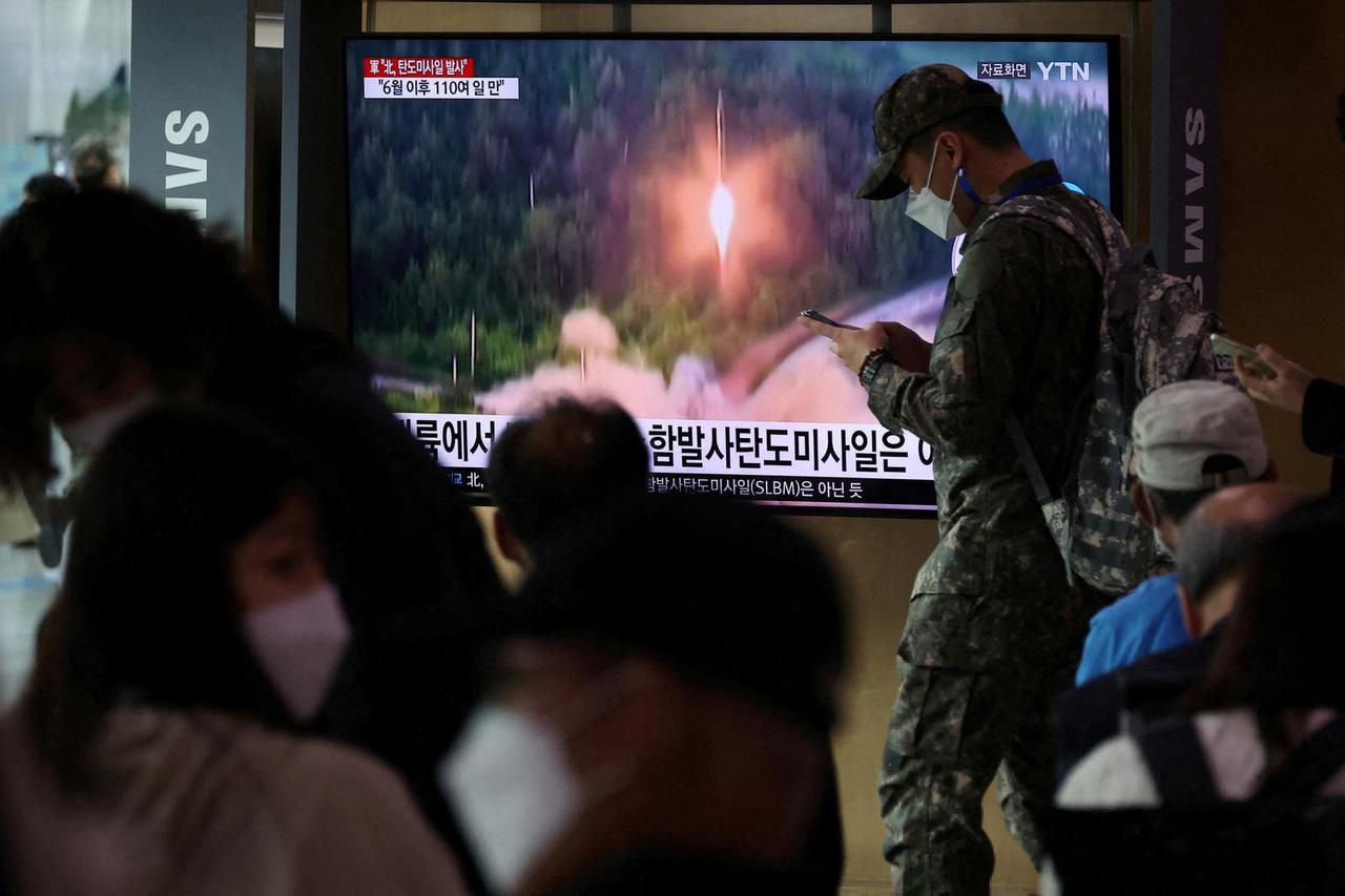 FILE PHOTO: North Korea fires a ballistic missile towards the sea off its east coast