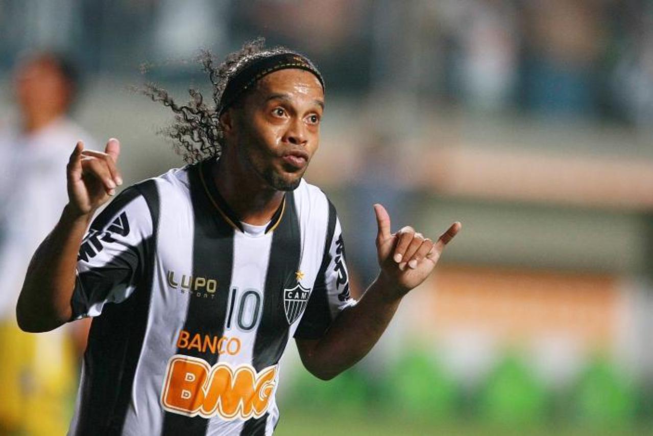 'Ronaldinho, of Brazil\'s Atletico Mineiro, celebrates after scoring against Bolivia\'s The Strongest during a Copa Libertadores match at Independencia Arena, in Belo Horizonte, southeastern Brazil, o