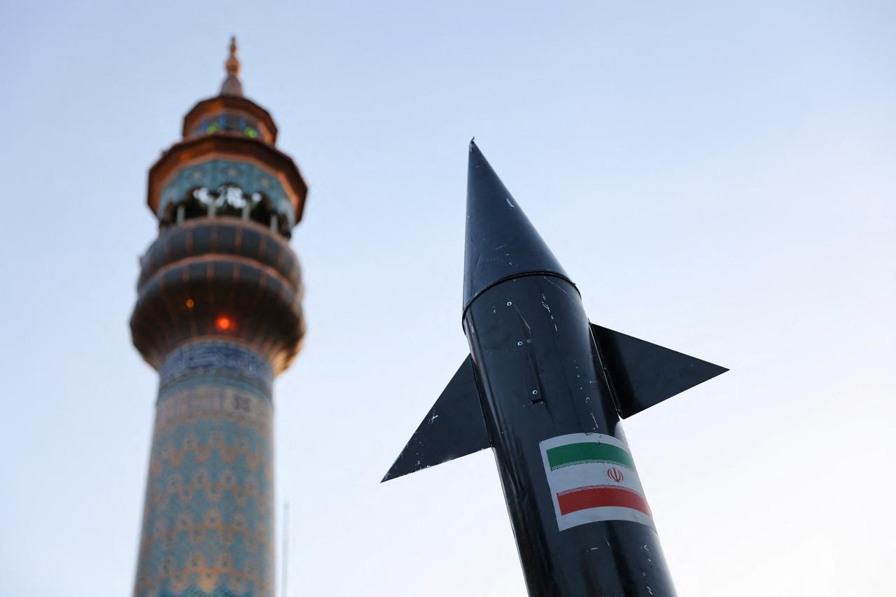 A model of a missile is seen during a celebration following the IRGC attack on Israel, in Tehran