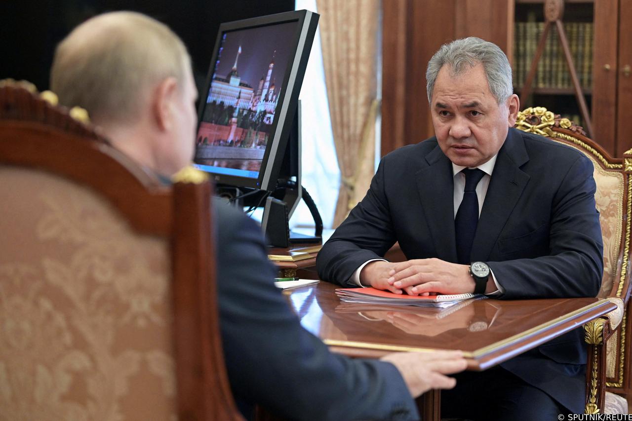Russia's President Vladimir Putin meets with Defence Minister Sergei Shoigu in Moscow
