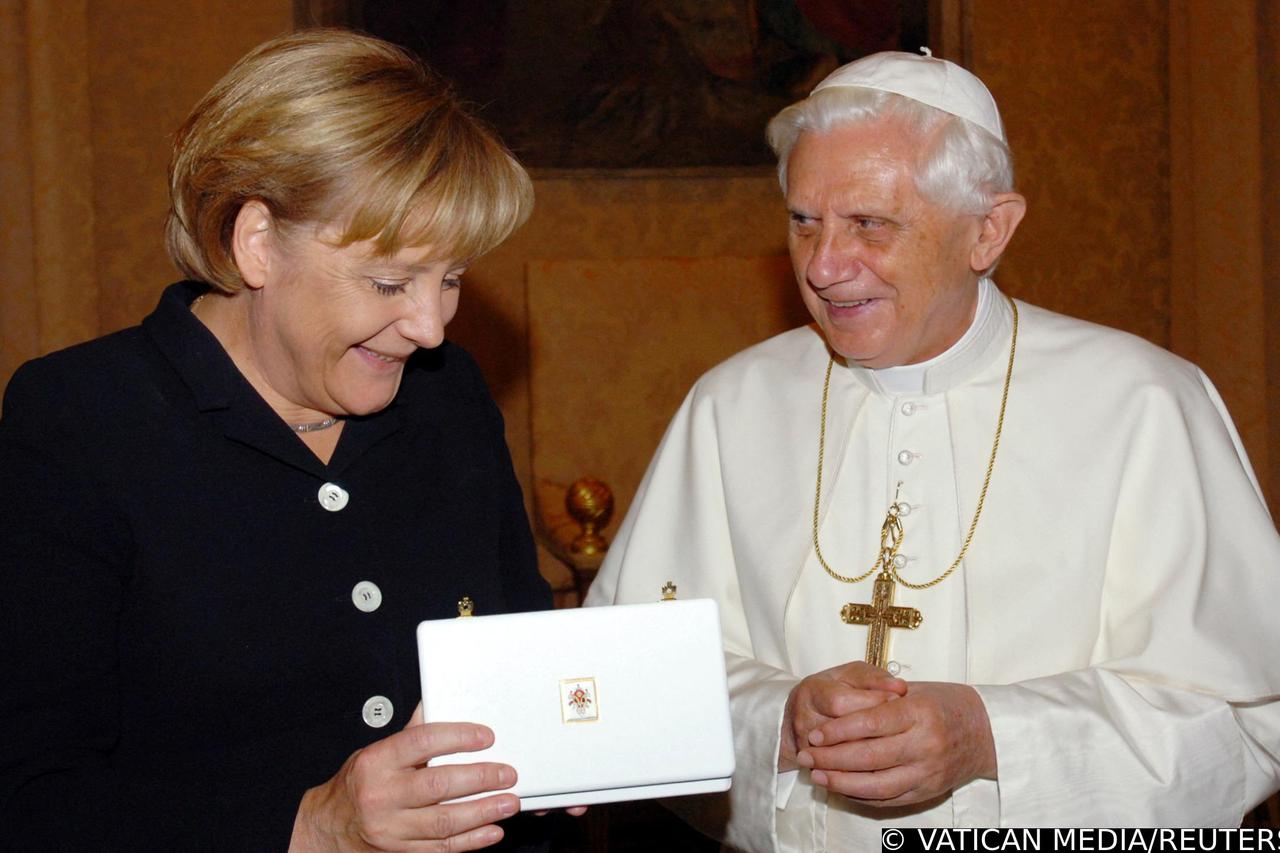 FILE PHOTO: German Chancellor Merkel meets Pope Benedict XVI at his summer residence in Castel Gandolfo