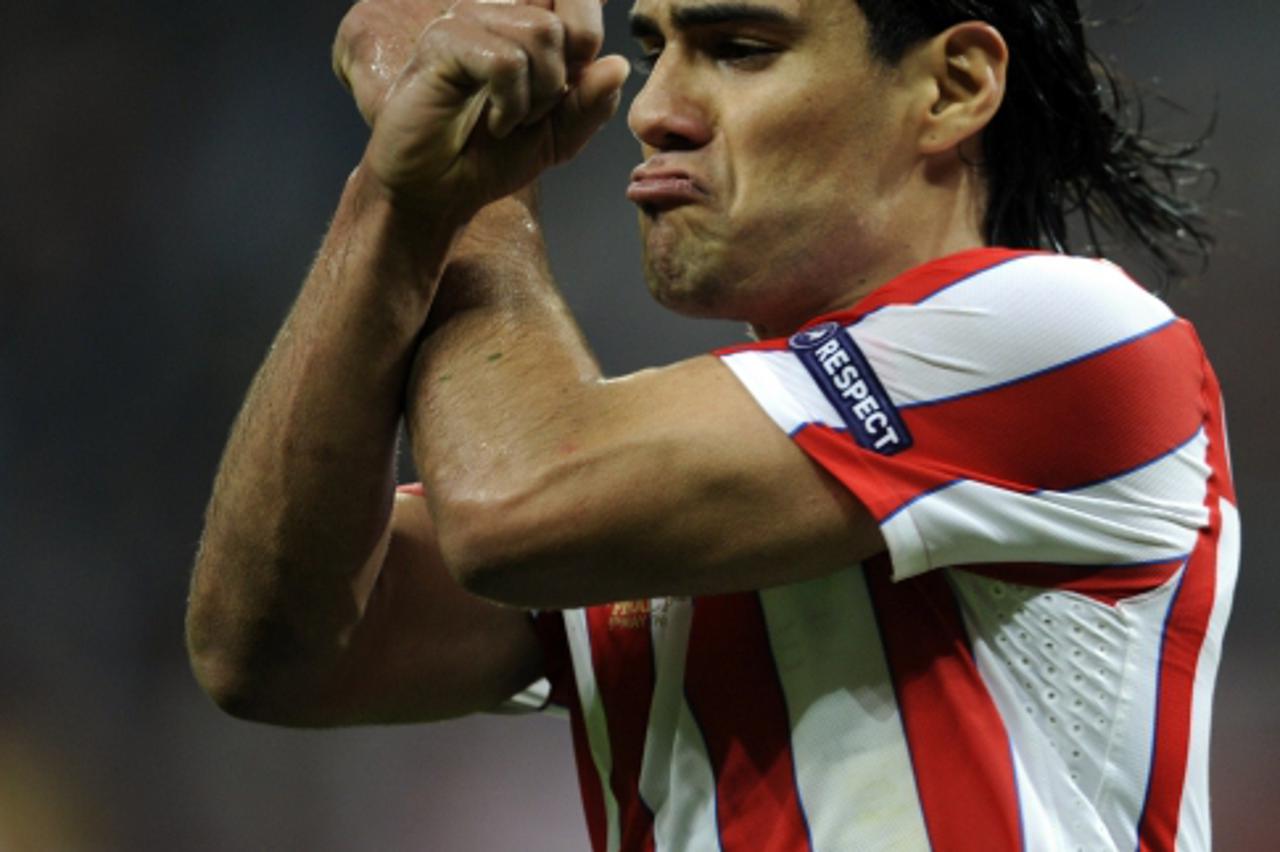 'TOPSHOTS  Atletico Madrid\'s Colombian forward Radamel Falcao celebrates after scoring a goal during the UEFA Europa League final football match between Club Atletico Madrid and Athletic Club Bilbao 