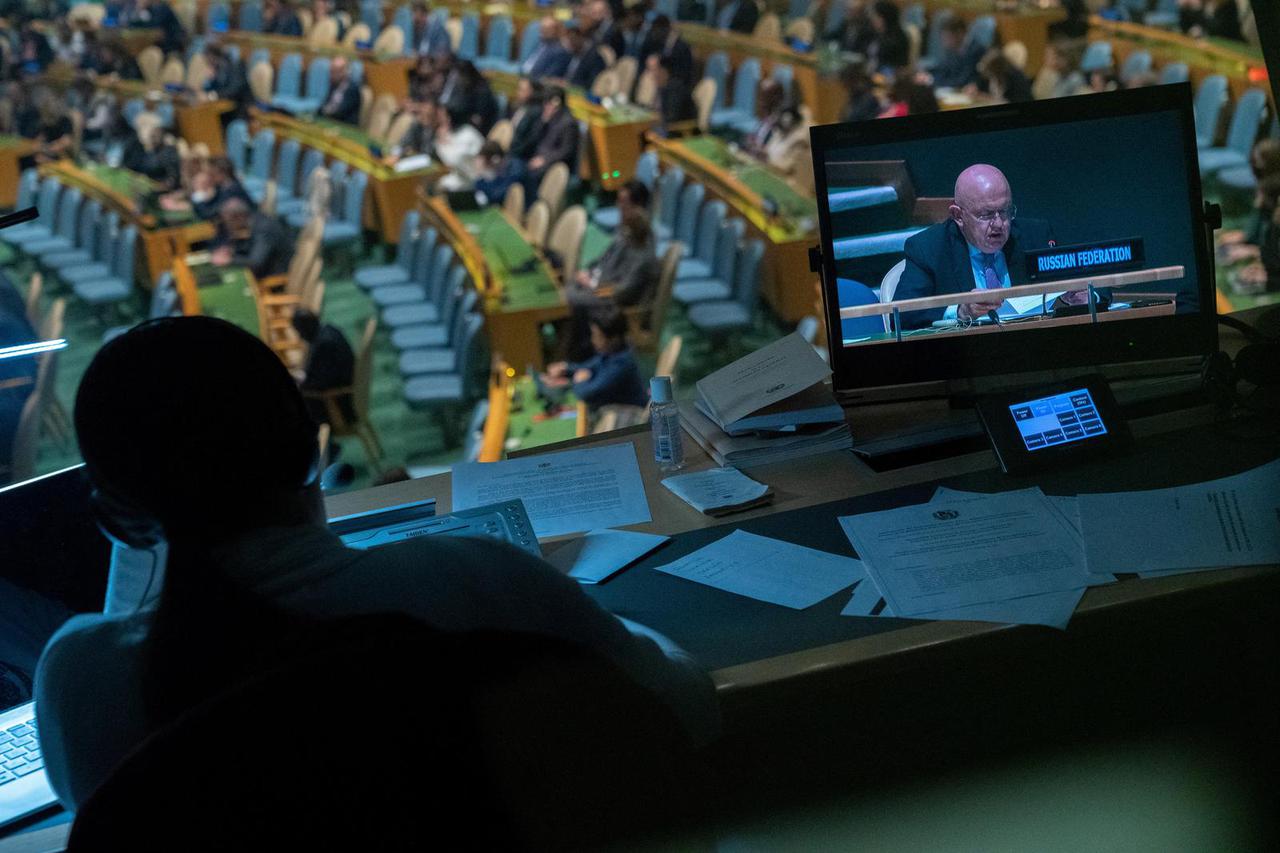 Russian Ambassador to the U.N. Vassily Nebenzia appears on a screen as he speaks prior to a vote on a resolution condemning the annexation of parts of ukkraineamid Russia's invasion of Ukraine, at the United Nations Headquarters