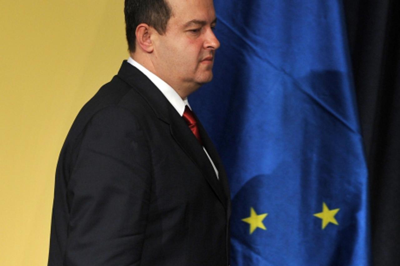 'Serbian Prime Minister Ivica Dacic arrives to give a press conference with EU enlargement commissioner after their meeting in Belgrade on October 11, 2012. Enlargement commissioner Stefan Fuele said 