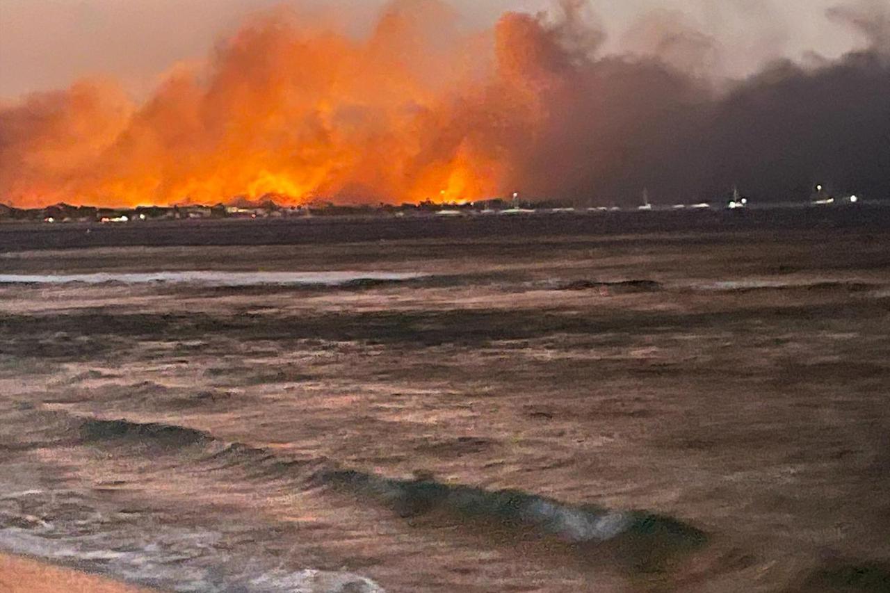 A view of flames near the ocean at the historic town of Lahaina