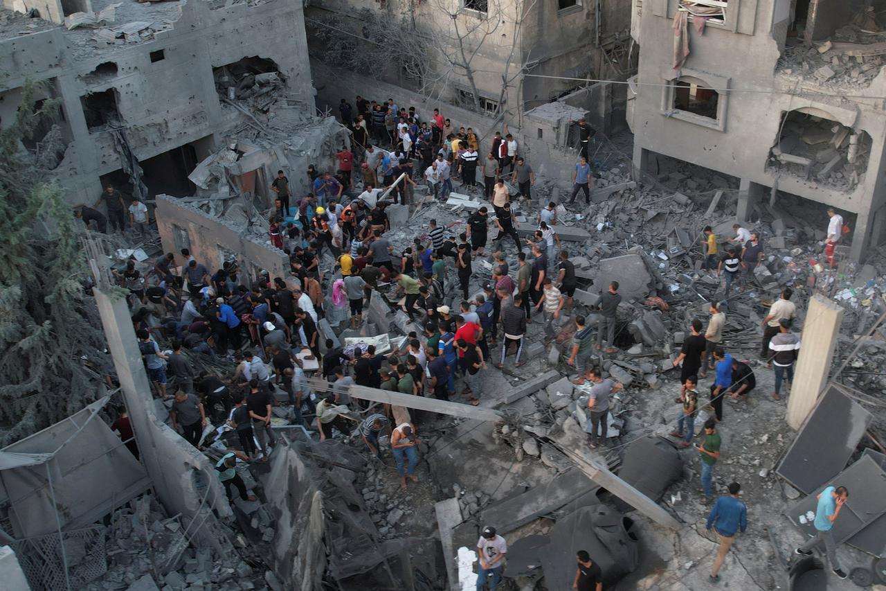 A view shows the site of Israeli strikes on houses in the central Gaza Strip