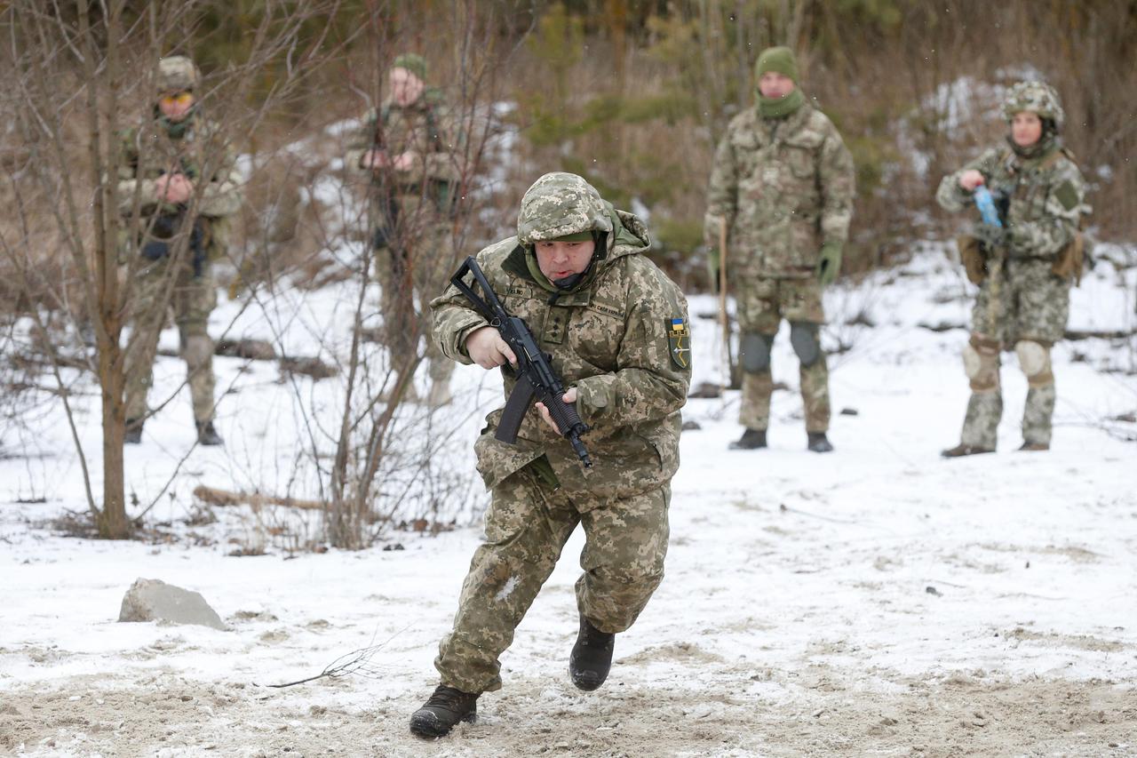 Ukrainian reservists take part in military exercises on the outskirts of Kyiv