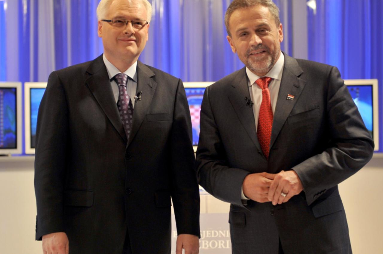 'Two main candidates for the upcoming second round of Croatian presidential elections - main opposition Social Democrats Party\\u0092s Ivo Josipovic (L) and independent Milan Bandic, pose for the pict