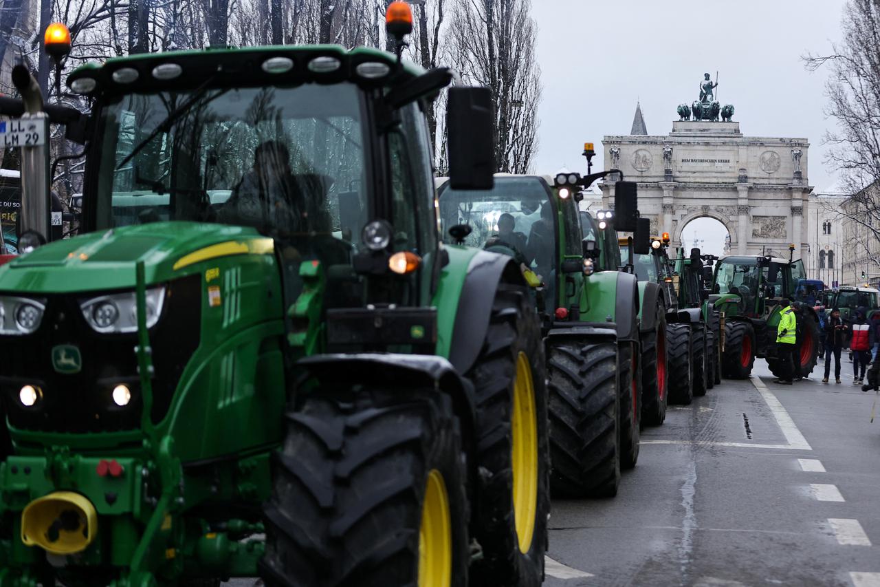German farmers take part in a protest against the cut of vehicle tax subsidies
