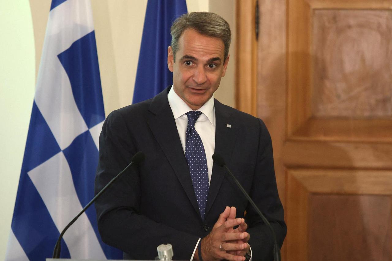 Greek Prime Minister Kyriakos Mitsotakis attends a news conference with Cyprus President Nikos Christodoulides at the Presidential Palace in Nicosia